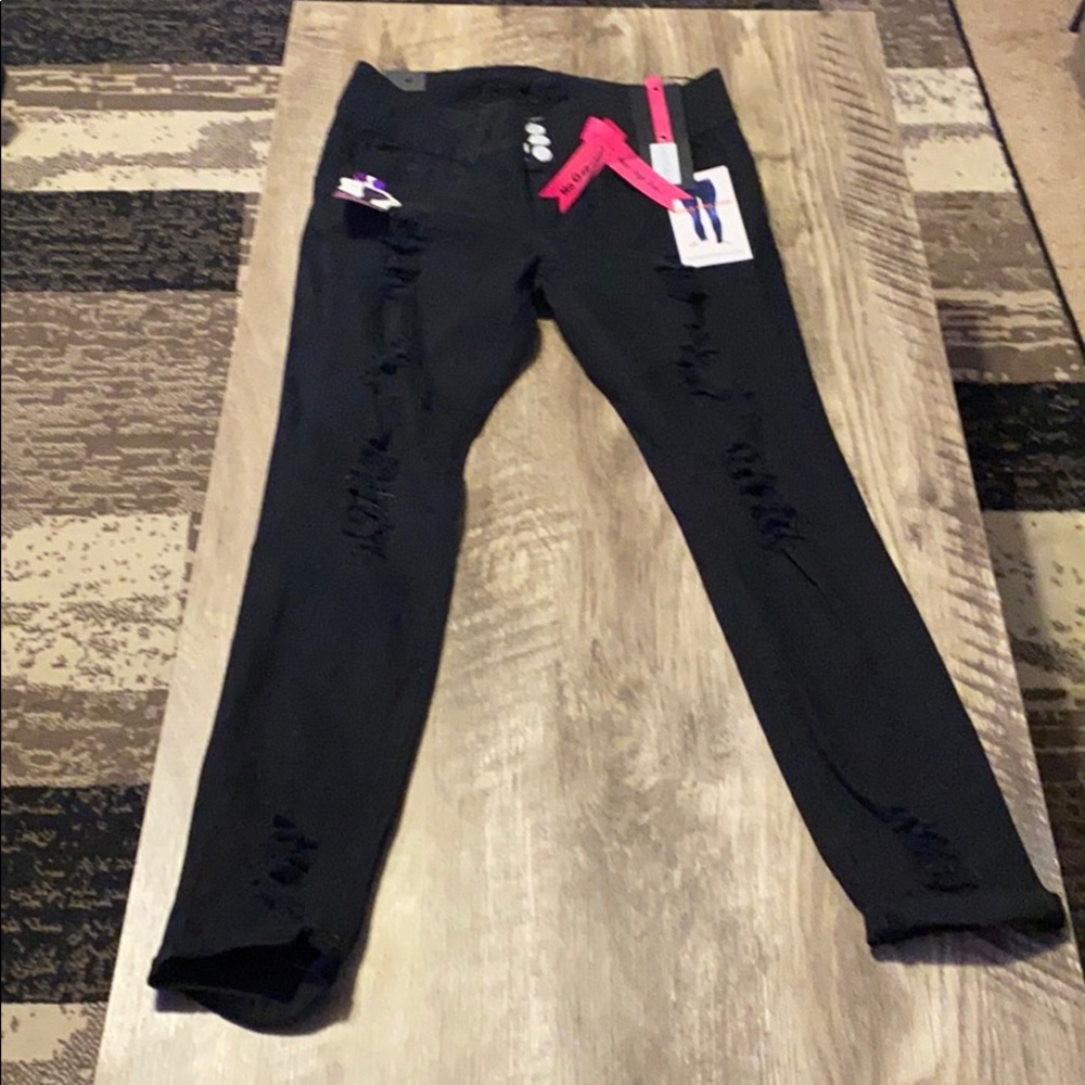 Soft butt lifting distressed black jeans